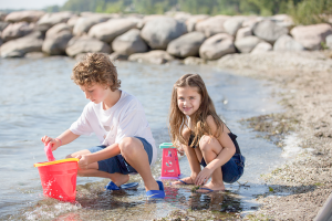 Children play on the beach at Friday Harbour